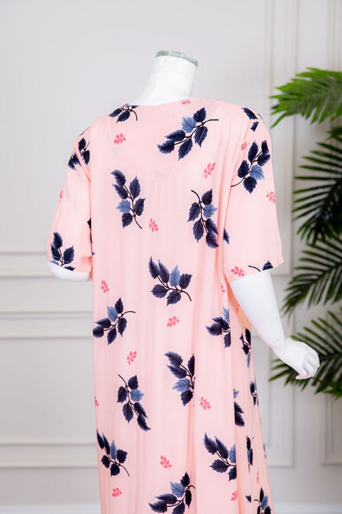 قميص نسائي طويل لون خربزي بطبعات أوراق الشجر و بياقة كلفة مطرزة ذو أكمام قصيرة