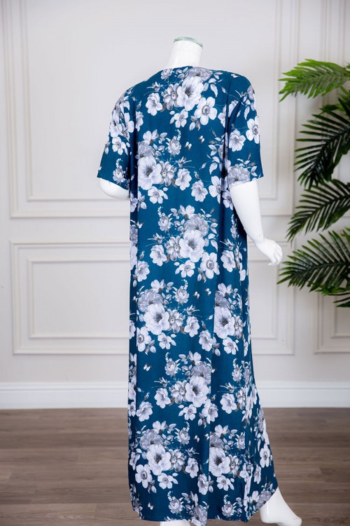 قميص نسائي طويل لون أزرق مزين بالورود ياقة دائرية بأزرار من الأمام ذو أكمام قصيرة