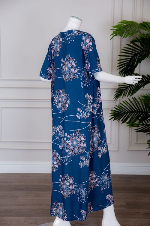 قميص نسائي طويل لون أزرق مزين بالورود ياقة دائرية بأزرار من الأمام ذو أكمام قصيرة