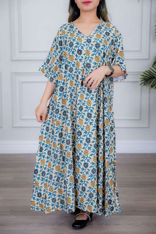 قميص نسائي لون بيج مزين بالورود الملونة ياقة قصة سبعة و أكمام ميدي