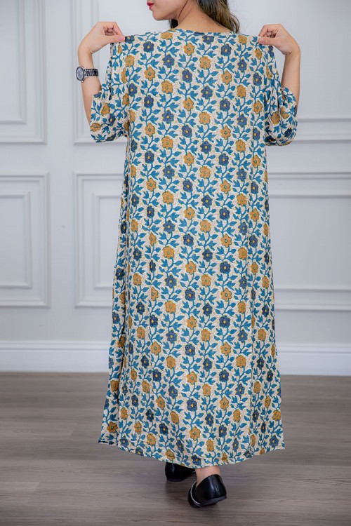 قميص نسائي لون بيج مزين بالورود الملونة ياقة قصة سبعة و أكمام ميدي