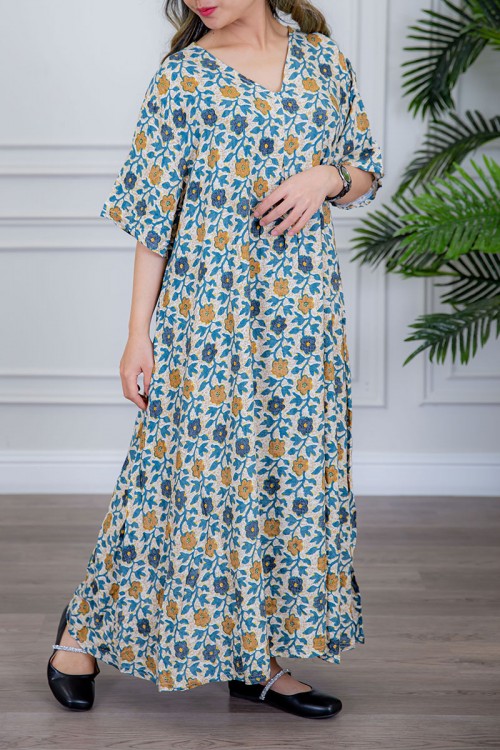 قميص نسائي لون بيج مزين بالورود الملونة ياقة قصة سبعة و أكمام ميدي