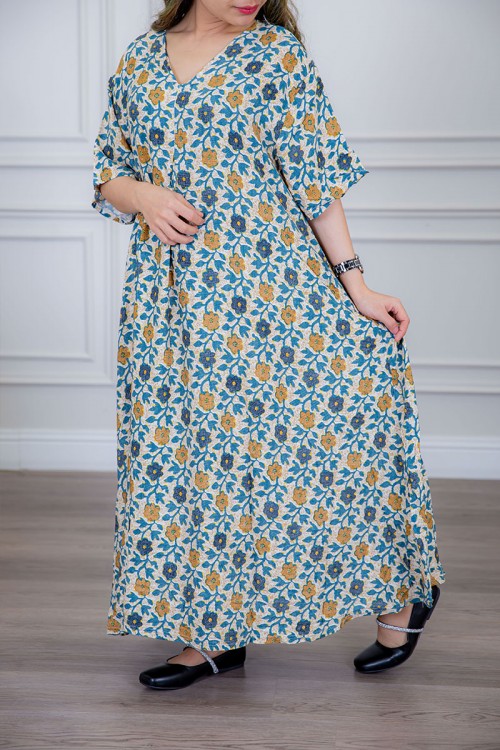 قميص نسائي لون بيج مزين بالورود الملونة ياقة قصة سبعة و أكمام ميدي