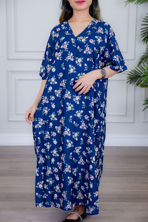 قميص نسائي لون أزرق مزين بالورود ياقة قصة سبعة و أكمام ميدي