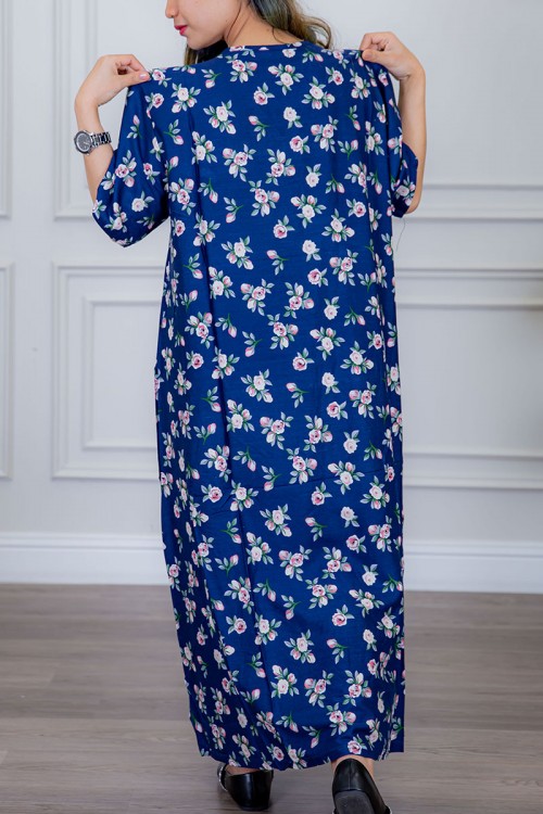 قميص نسائي لون أزرق مزين بالورود ياقة قصة سبعة و أكمام ميدي