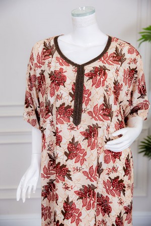 قميص نسائي طويل لون بيج مشجر بياقة كلفة مطرزة ذو أكمام ميدي