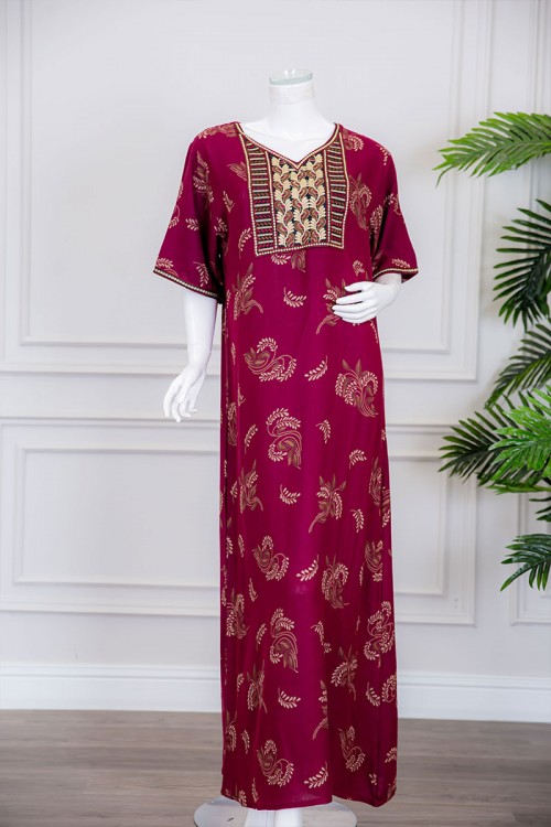 قميص نسائي طويل لون عودي مزين برسومات و بياقة كلفة مطرزة ذو أكمام ميدي