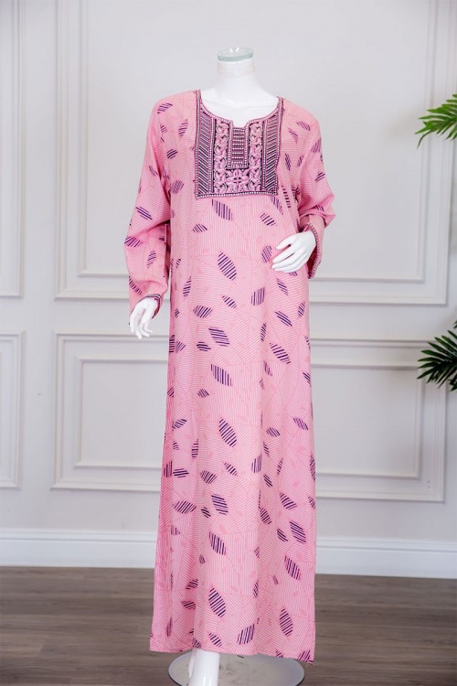 قميص نسائي طويل لون وردي مزين برسومات و بياقة كلفة مطرزة ذو أكمام طويلة