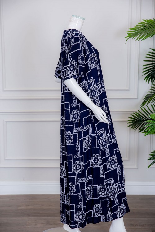 قميص نسائي طويل لون كحلي مزين برسومات مختلفة ياقة دائرية بأزرار من الأمام ذو أكمام قصيرة