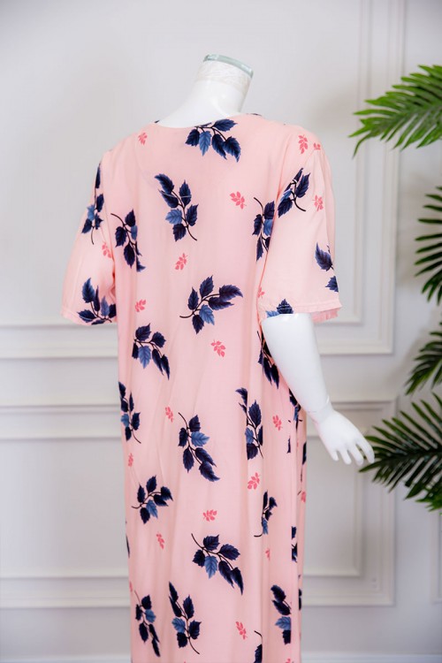 قميص نسائي طويل لون خربزي مزين برسومات أوراق الشجر ياقة دائرية بأزرار من الأمام ذو أكمام قصيرة