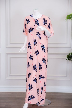 قميص نسائي طويل لون خربزي مزين برسومات أوراق الشجر ياقة دائرية بأزرار من الأمام ذو أكمام قصيرة