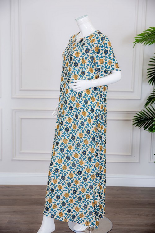 قميص نسائي لون بيج مزين بالورود الملونة ياقة قصة سبعة و أكمام ميدي