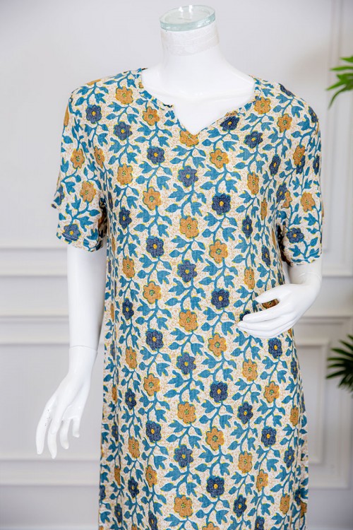 قميص نسائي لون بيج مزين بالورود الملونة ياقة قصة سبعة و أكمام ميدي