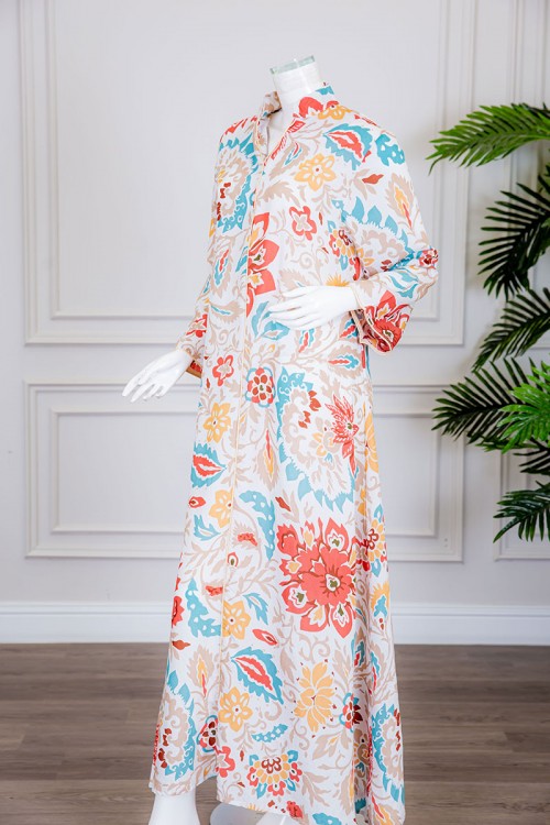 جلابية نسائية طويلة لون بيج بتشجير ملون ياقة عالية بقصة سبعة و أكمام طويلة