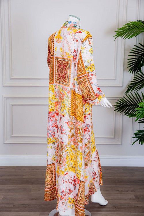 جلابية نسائية طويلة لون أبيض مشجر باللون الأصفر و البرتقالي ياقة عالية بقصة سبعة و أكمام طويلة