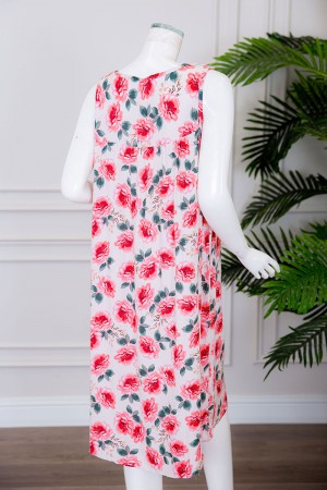 قميص نسائي قصير لون بيج مزين بالورود ياقة دائرية بدون أكمام