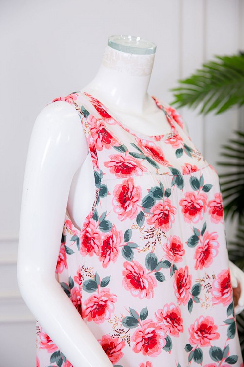 قميص نسائي قصير لون بيج مزين بالورود ياقة دائرية بدون أكمام