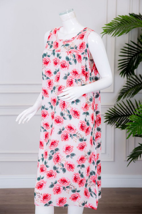 قميص نسائي قصير لون بيج مزين بالورود ياقة دائرية بدون أكمام