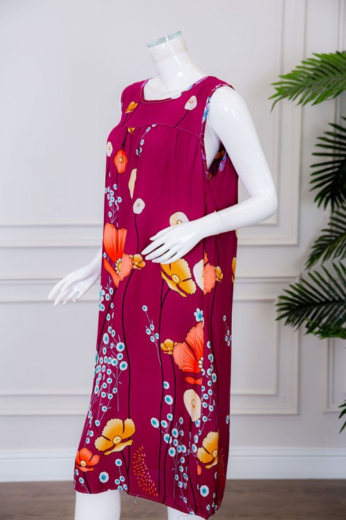 قميص نسائي قصير لون عودي مزين بالورود ياقة دائرية بدون أكمام