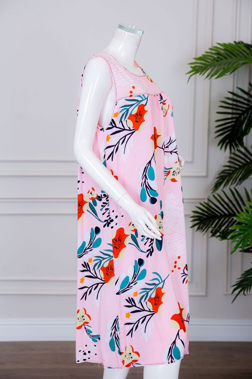 قميص نسائي قصير لون وردي مزين بالورود ياقة دائرية بدون أكمام