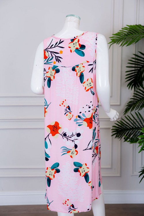 قميص نسائي قصير لون وردي مزين بالورود ياقة دائرية بدون أكمام