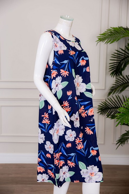 قميص نسائي قصير لون كحلي مزين بالورود ياقة دائرية بدون أكمام