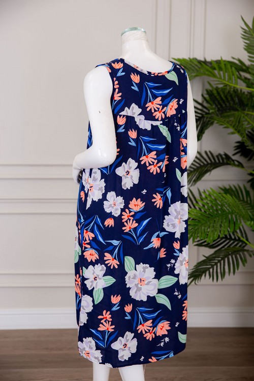 قميص نسائي قصير لون كحلي مزين بالورود ياقة دائرية بدون أكمام