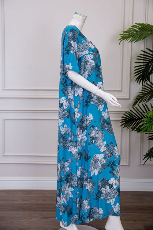 قميص نسائي طويل لون سماوي مشجر بياقة قصة سبعة برباط ذو أكمام قصيرة