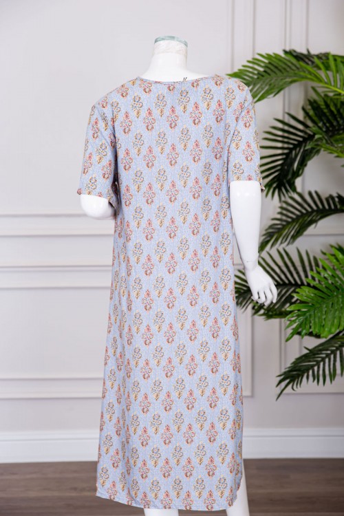 قميص نسائي ميدي مزين برسومات ياقة قصة سبعة و بجيوب من الأمام ذو أكمام قصيرة