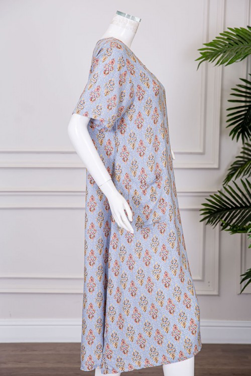 قميص نسائي ميدي مزين برسومات ياقة قصة سبعة و بجيوب من الأمام ذو أكمام قصيرة