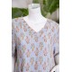 قميص نسائي ميدي مزين برسومات ياقة قصة سبعة و بجيوب من الأمام ذو أكمام قصيرة