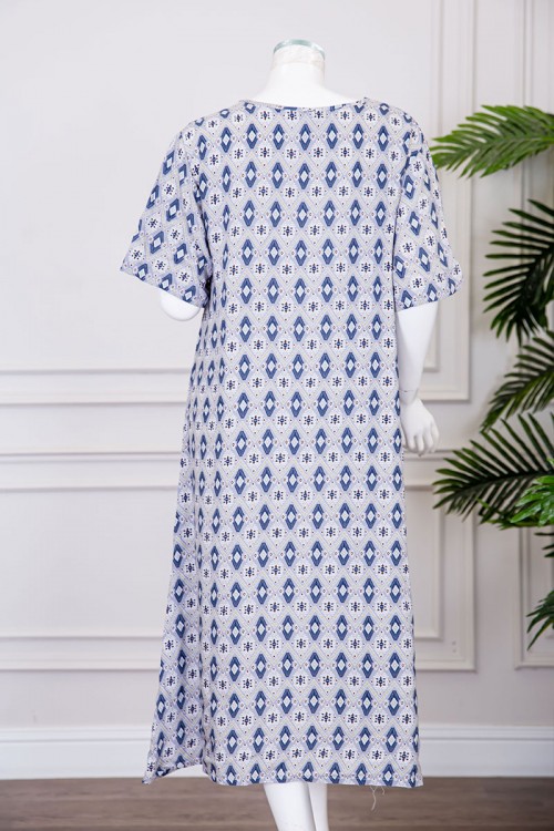 قميص نسائي ميدي مزين بزخارف ياقة قصة سبعة و بجيوب من الأمام ذو أكمام قصيرة