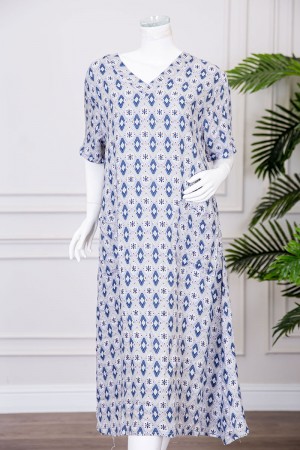 قميص نسائي ميدي مزين بزخارف ياقة قصة سبعة و بجيوب من الأمام ذو أكمام قصيرة