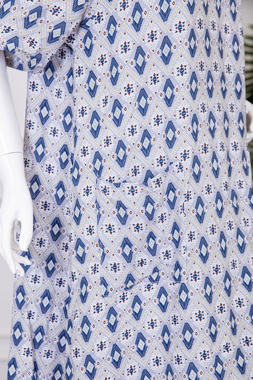 قميص نسائي ميدي مزين بزخارف ياقة قصة سبعة و بجيوب من الأمام ذو أكمام قصيرة