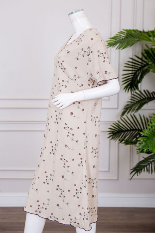 قميص نسائي ميدي لون بيج مشجر ياقة دائرية مزينة بفيونكة و بأكمام قصيرة