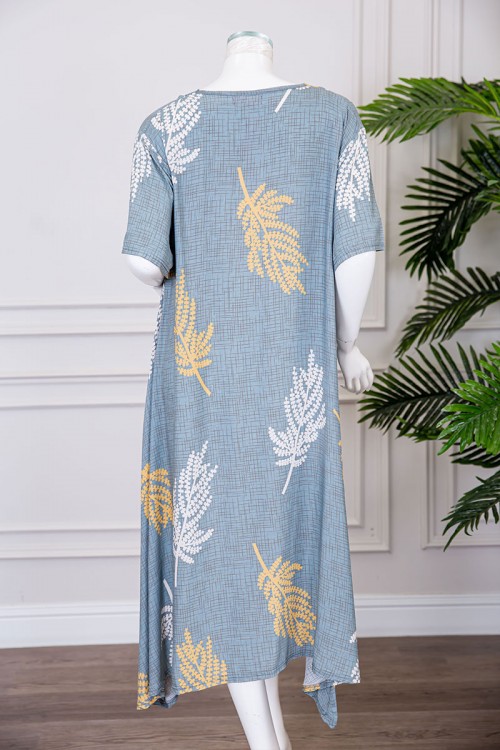 قميص نسائي ميدي لون سماوي مشجر ياقة قصة سبعة و بأكمام قصيرة