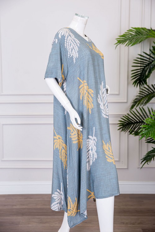 قميص نسائي ميدي لون سماوي مشجر ياقة قصة سبعة و بأكمام قصيرة