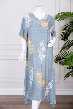 قميص نسائي ميدي لون سماوي مشجر ياقة قصة سبعة و بأكمام قصيرة