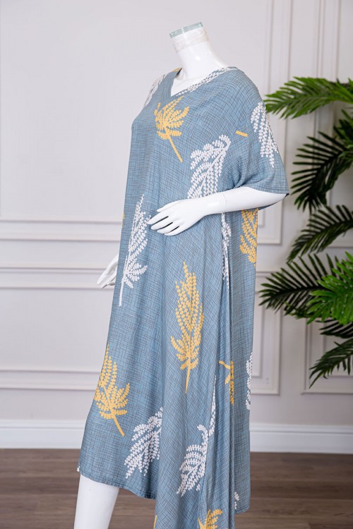 قميص نسائي ميدي لون سماوي مشجر ياقة قصة سبعة و بأكمام قصيرة