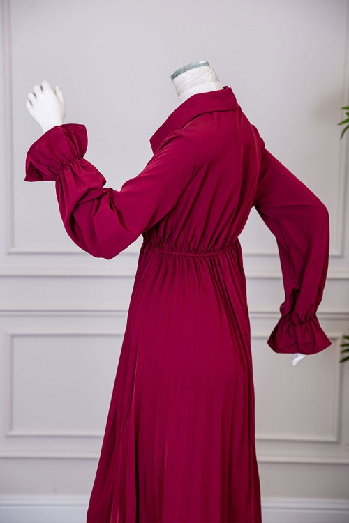 فستان نسائي ميدي لون عودي ياقة مطوية بأزرار من الأمام و بزم في الخصر و الأكمام