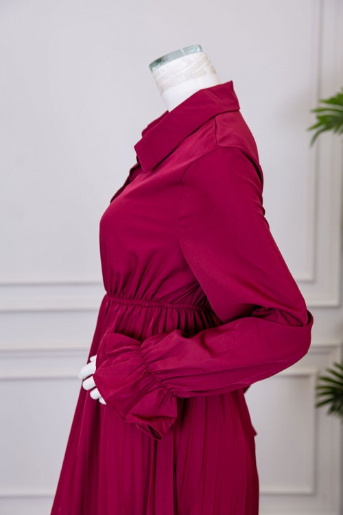 فستان نسائي ميدي لون عودي ياقة مطوية بأزرار من الأمام و بزم في الخصر و الأكمام