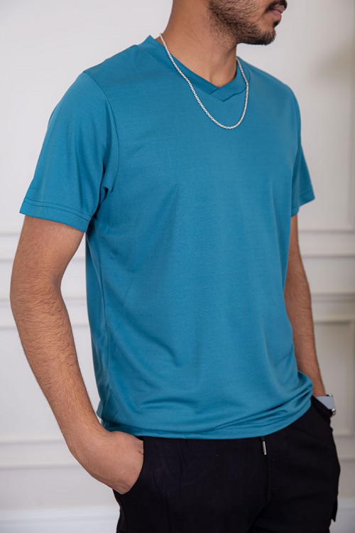 تيشيرت رجالي لون تركواز بياقة دائرية سادة