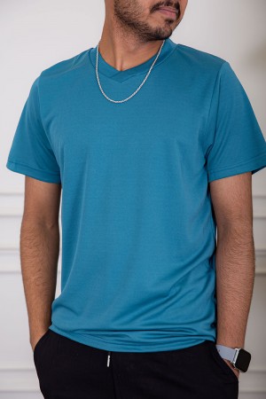 تيشيرت رجالي لون تركواز بياقة دائرية سادة