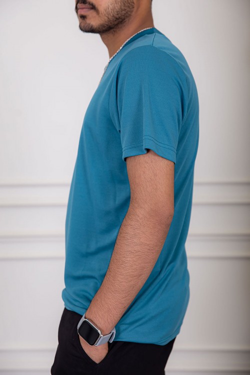 تيشيرت رجالي لون تركواز بياقة دائرية سادة