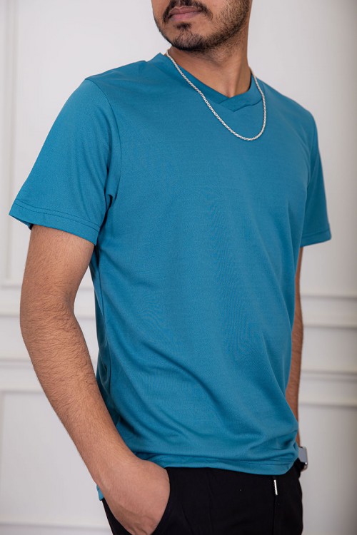 تيشيرت رجالي لون تركواز بياقة دائرية سادة