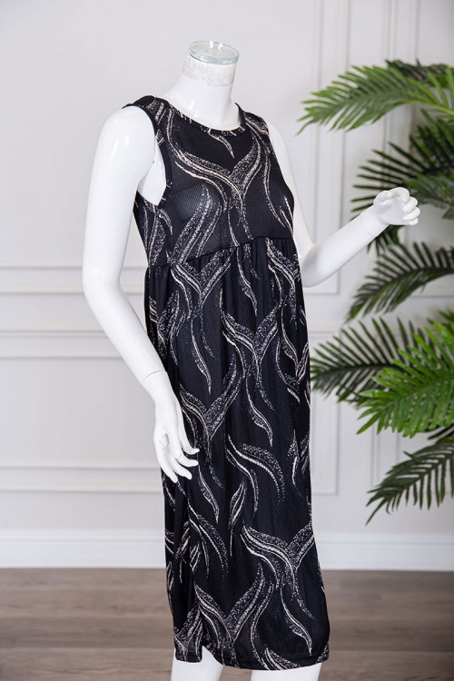 قميص نسائي قصير لون أسود مزين برسومات باللون البيج ياقة دائرية و بدون أكمام