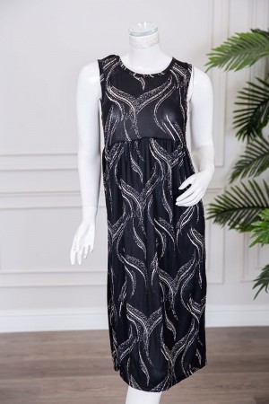 قميص نسائي قصير لون أسود مزين برسومات باللون البيج ياقة دائرية و بدون أكمام