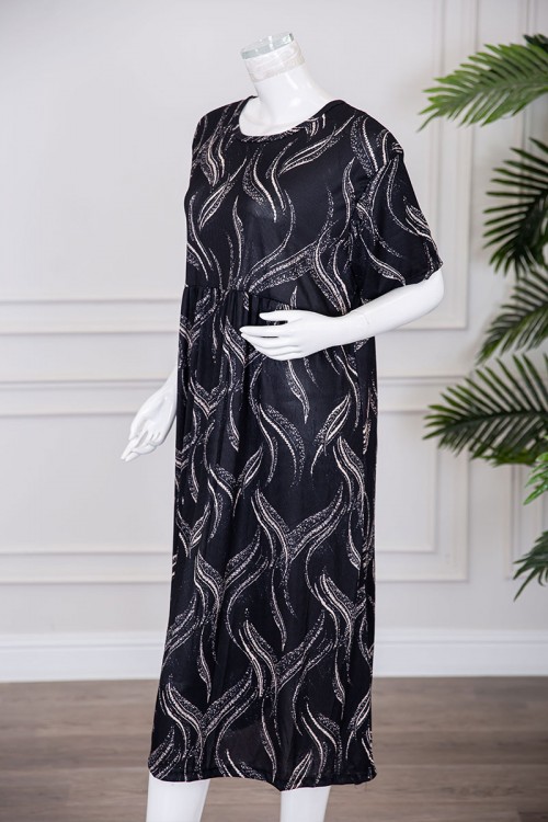 قميص نسائي قصير لون أسود قصة كلوش مزين برسومات باللون البيج ياقة دائرية و بأكمام قصيرة