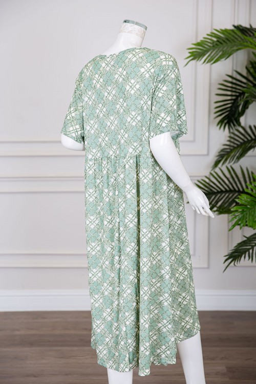 قميص نسائي قصير لون تفاحي قصة كلوش مزين بخطوط و أشكال ياقة دائرية و بأكمام قصيرة