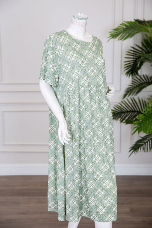 قميص نسائي قصير لون تفاحي قصة كلوش مزين بخطوط و أشكال ياقة دائرية و بأكمام قصيرة